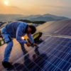 A worker installing solar panels in Songxi, China, in 2016. (Feature China/Barcroft Images/Barcroft Media via Getty Images)
