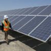 Solar-technicians-inspect-panels