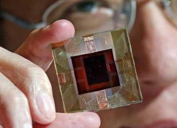 New records in perovskite-silicon tandem solar cells through improved light management