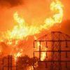Flames-burn-near-power-lines-in-Montecito,-Calif
