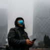 man-wears-a-protective-mask-Beijing-pollution