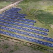 The Barnwell micro solar grid sits in the corner of a field