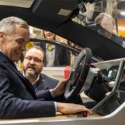 Automotive-Parts-Manufacturers’-Association-President-Flavio-Volpe-shows-Prime-Minister-Mark-Carney,-front,-the-Project-Arrow-2.0-prototype-vehicle