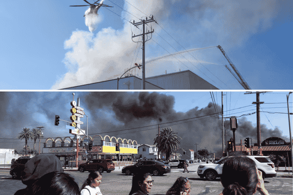 Clouds of dark smoke and ammonia rose from cold storage and freezing facility in Boyle Heights near downtown