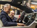 Automotive-Parts-Manufacturers’-Association-President-Flavio-Volpe-shows-Prime-Minister-Mark-Carney,-front,-the-Project-Arrow-2.0-prototype-vehicle